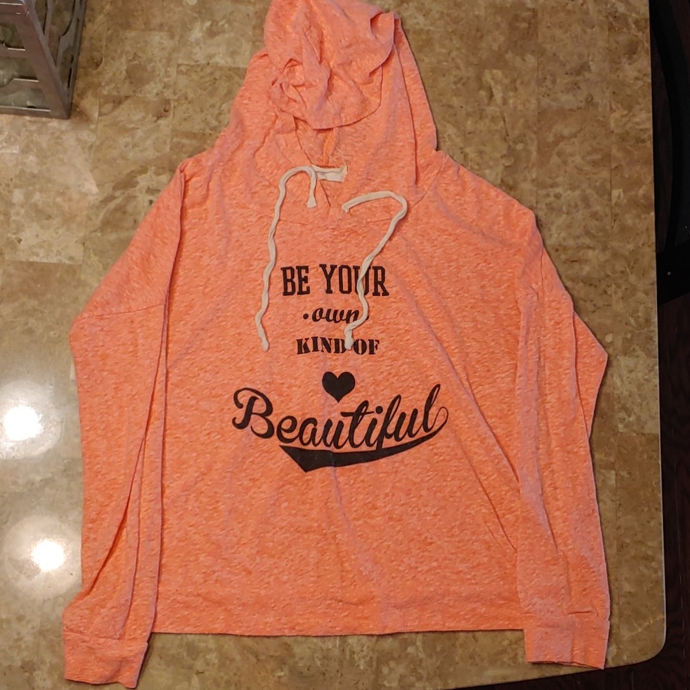 A blushed long sleeve pink hoodie
